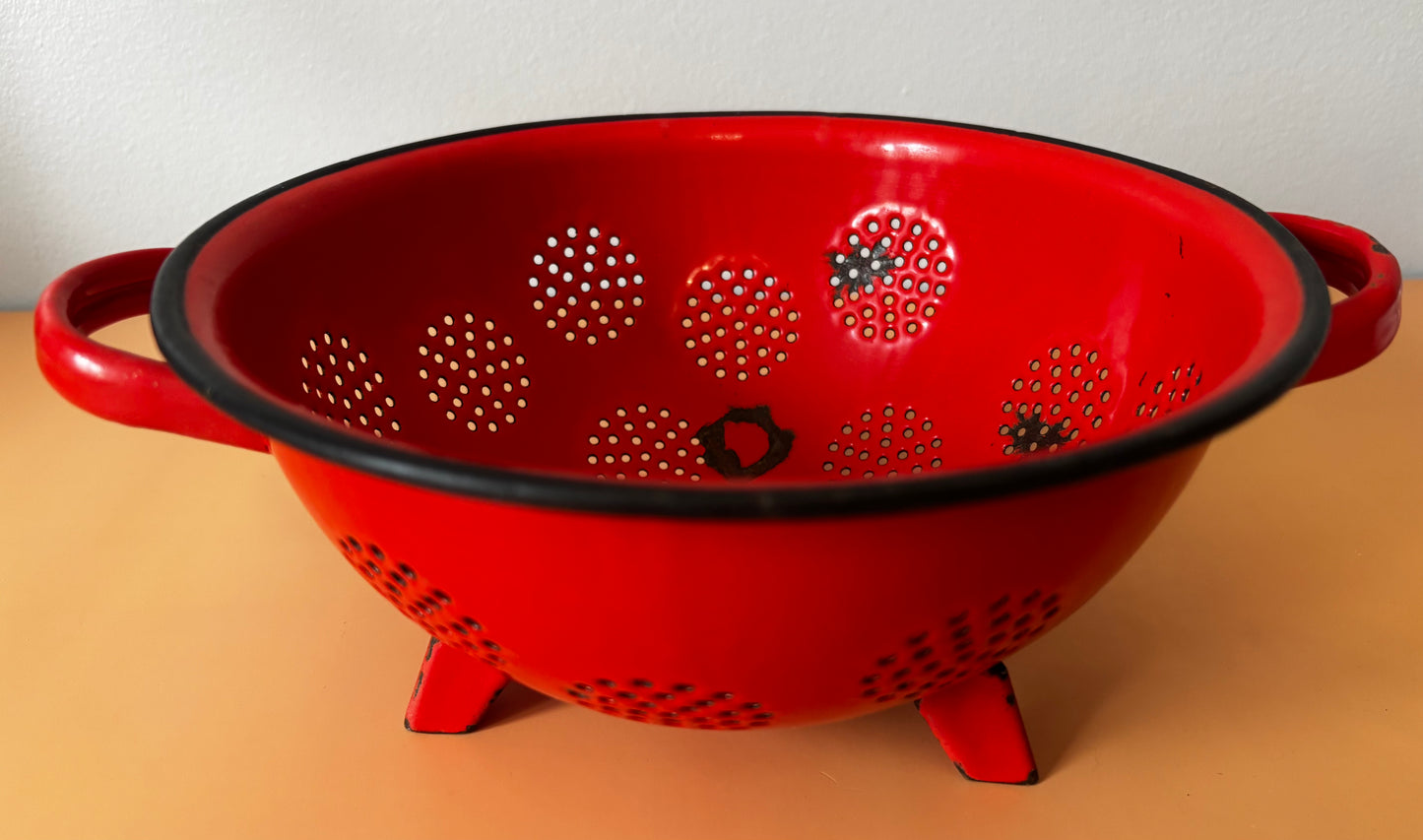 Passoire émaillée rouge