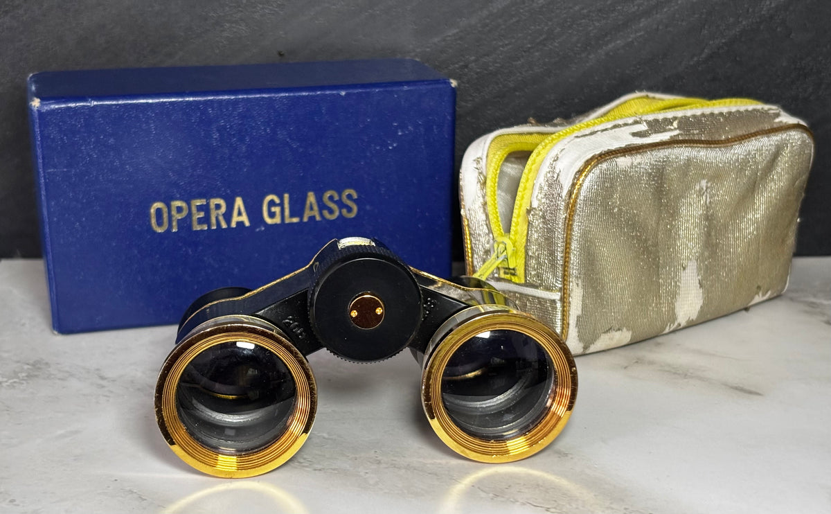 Jumelles de théâtre vintage noires et dorées dans sa boîte d'origine