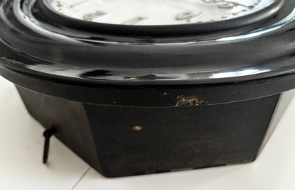 Horloge "Oeil de Boeuf"