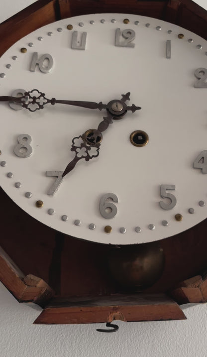 Horloge "Oeil de Boeuf"