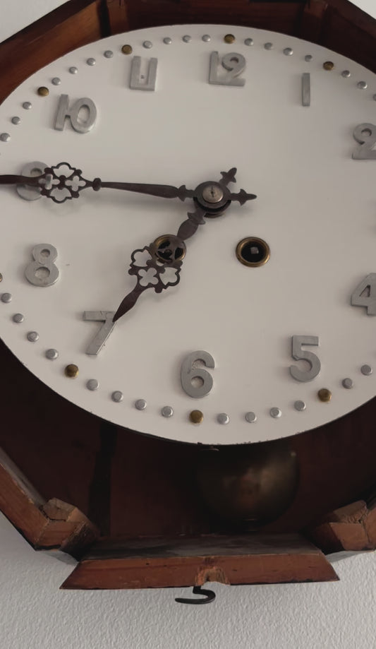 Horloge "Oeil de Boeuf"